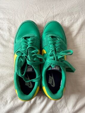Nike Women’s Green Sneakers with Yellow Swoosh